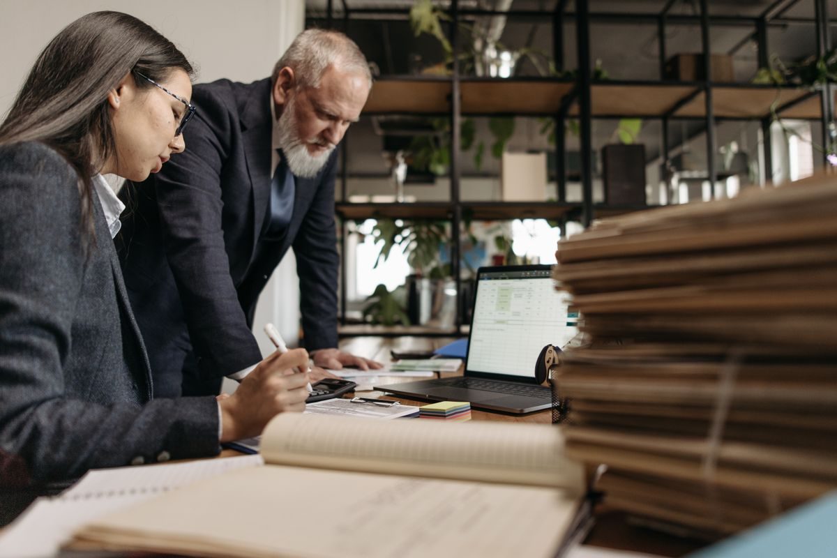 Coworkers reviewing work